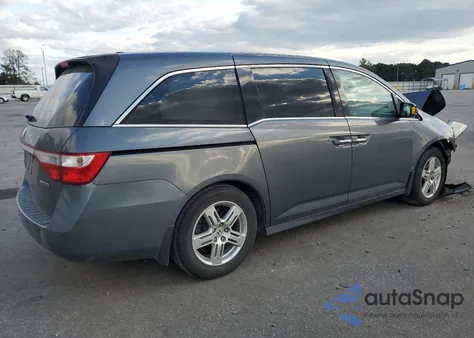 2012 Honda Odyssey Touring z USA, uszkodzony, nr VIN 5FNRL5H9XCB024763